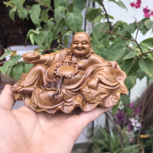 Di lặc ngồi để ô tô, bàn làm việc