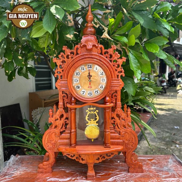Đồng hồ để bàn quả lắc đuôi công gỗ hương cao cấp